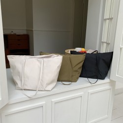 Korean high-end drawstring tote shoulder bag, stylish, large capacity, shopping bag, nylon, simple and suitable for commuting.