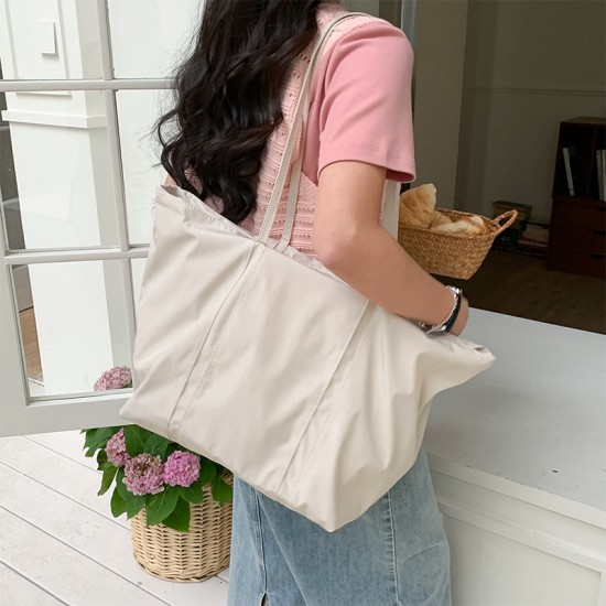 Korean high-end drawstring tote shoulder bag, stylish, large capacity, shopping bag, nylon, simple and suitable for commuting.