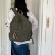 Japanese and Korean style washed canvas backpack with small floral rope, simple, fashionable, retro, versatile, and artistic style.