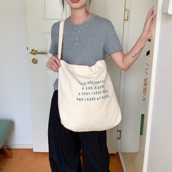 Japanese and Korean style, relaxed and casual look, 2025 new printed canvas bag, large capacity, fresh and simple college style tote bag.