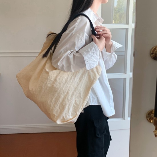 2025 Spring/Summer new Korean style minimalist retro large capacity nylon cloth bag, versatile Mori style literary solid color shoulder bag