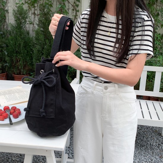Korean ins fresh sweet matching style spring and summer 2023 pocket canvas bag fashion drawstring bucket crossbody bag