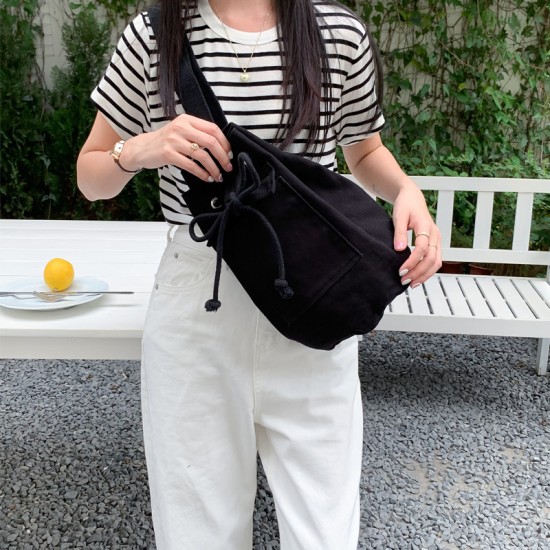 Korean ins fresh sweet matching style spring and summer 2023 pocket canvas bag fashion drawstring bucket crossbody bag